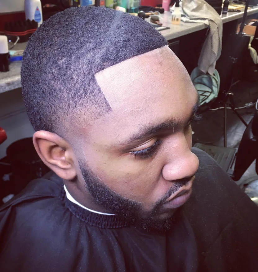 After photo of the same client with a crisp fade and beard line