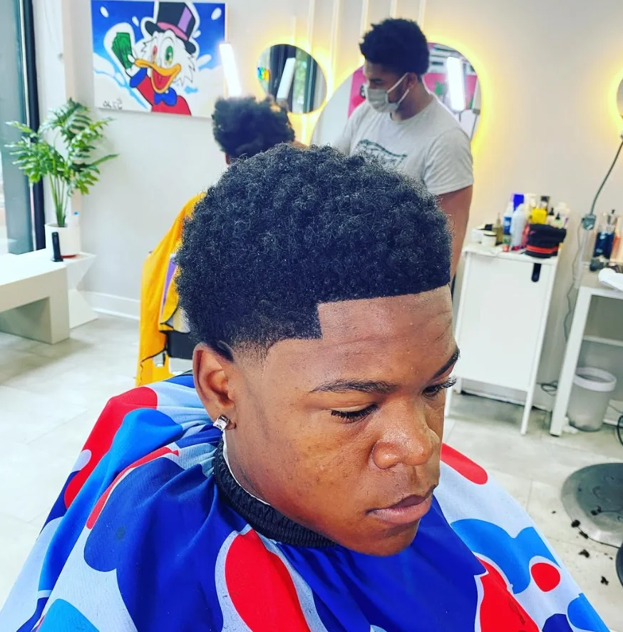 Finished textured haircut with a sharp front line