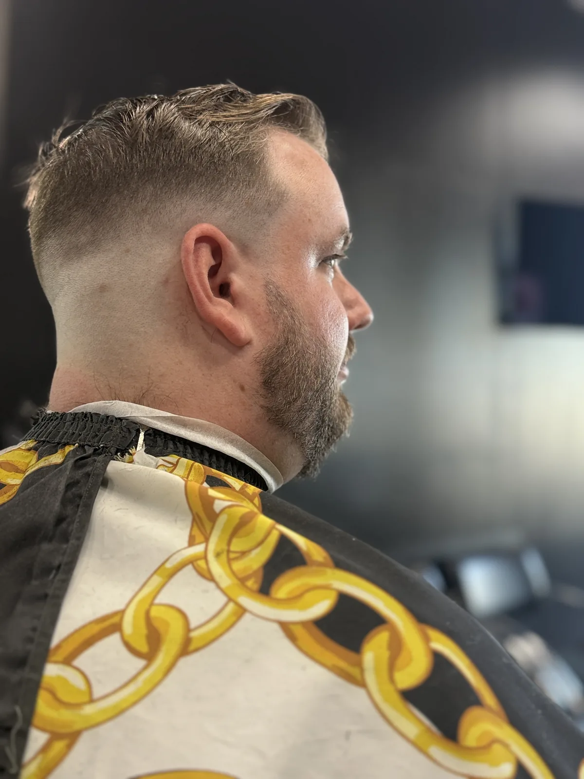 A finished taper seen from behind, blended clean from the crown into the neckline